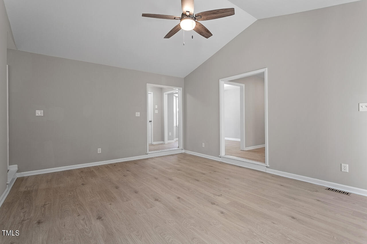 5404 Passenger Place Raleigh, NC 27603 - Photo 12 of 25 a view of an empty room with a window