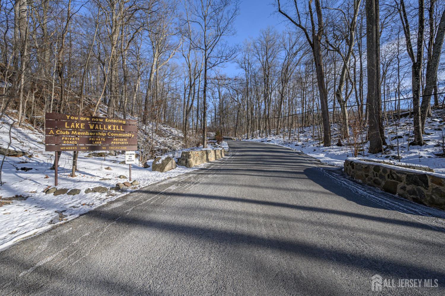 10 Flatbush Road Sussex, NJ 07461 - Photo 6 of 15 a view of street with large trees