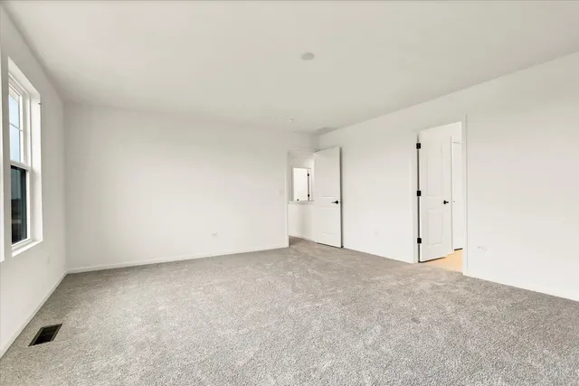 an empty room with a natural light