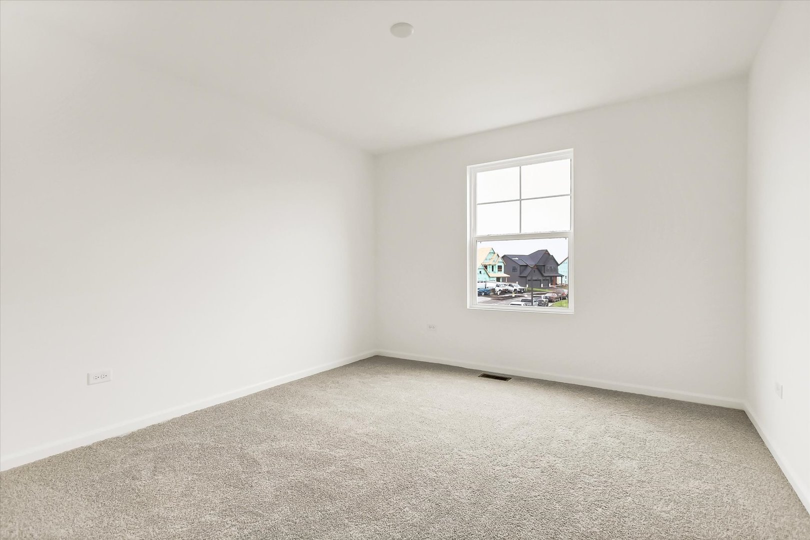 11351 Saxony Street Huntley, IL 60142 - Photo 24 of 29 an empty room with windows