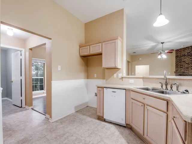 a bathroom with a sink a vanity and a mirror