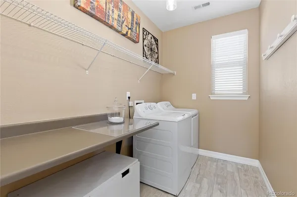 a view of kitchen and utility room