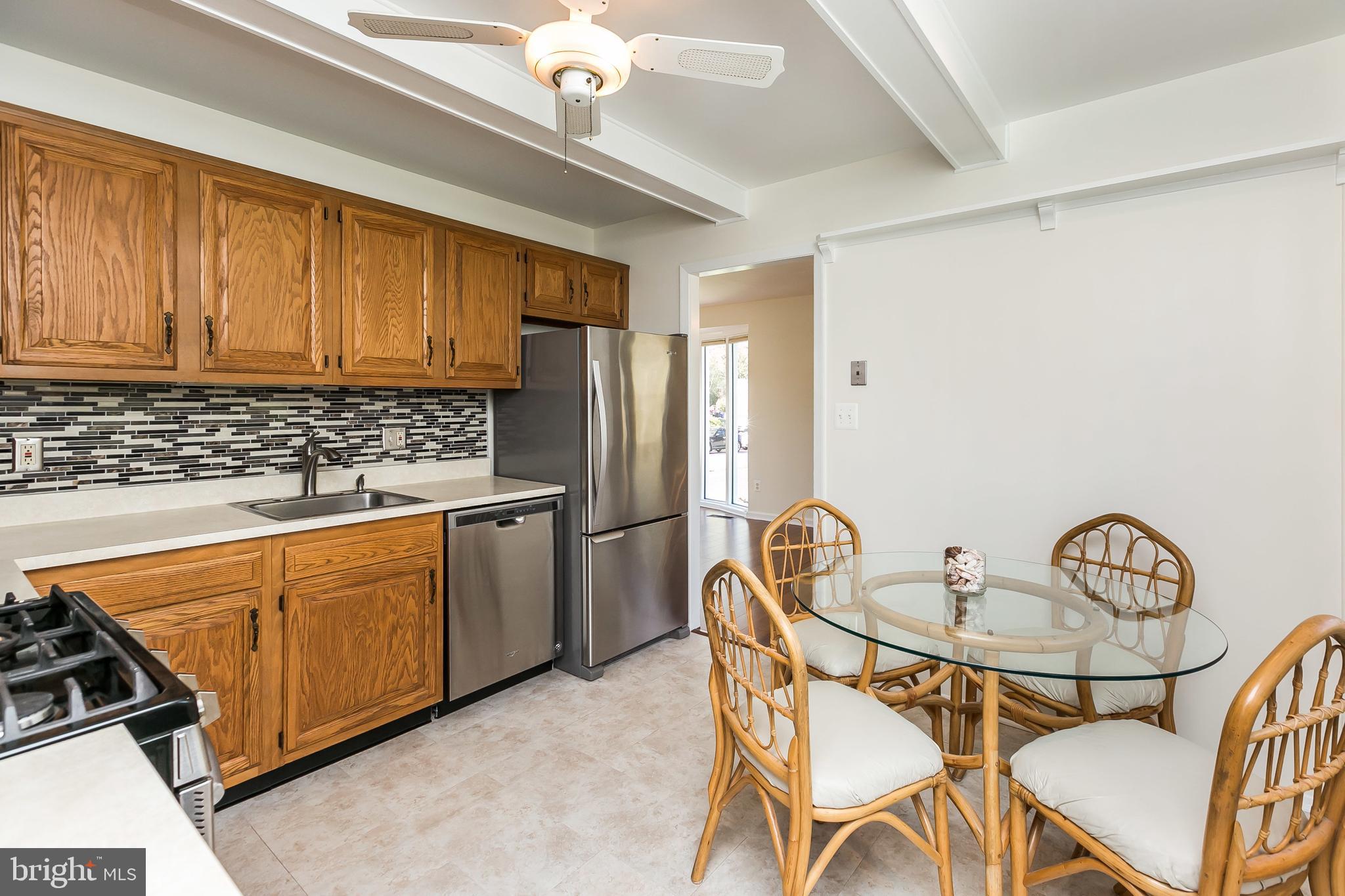 9101 Covered Bridge Road Baltimore, MD 21234 - Photo 16 of 53 Room for table and chairs