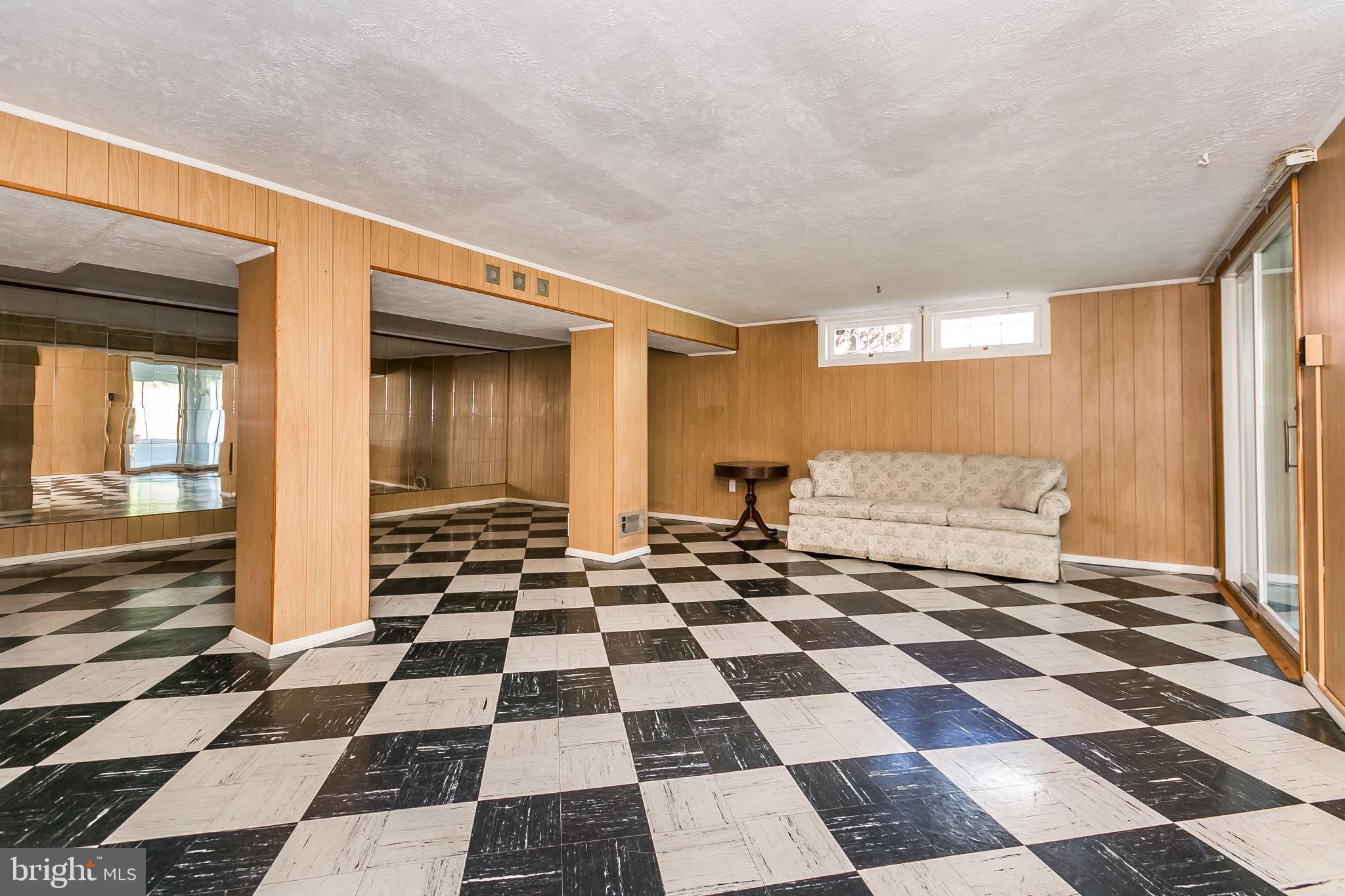 9101 Covered Bridge Road Baltimore, MD 21234 - Photo 36 of 53 finished basement - floors are in great condition