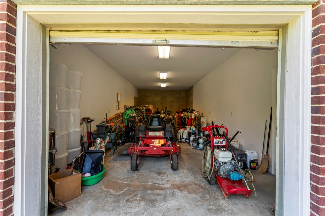 579 Terrapin Crossing Road Pickens, SC 29671 - Photo 43 of 50 Secure basement level garage space offers versatile storage and convenient access.
