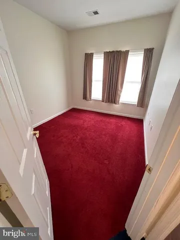 an empty room with closet