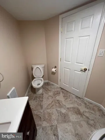 a view of a garden and deck