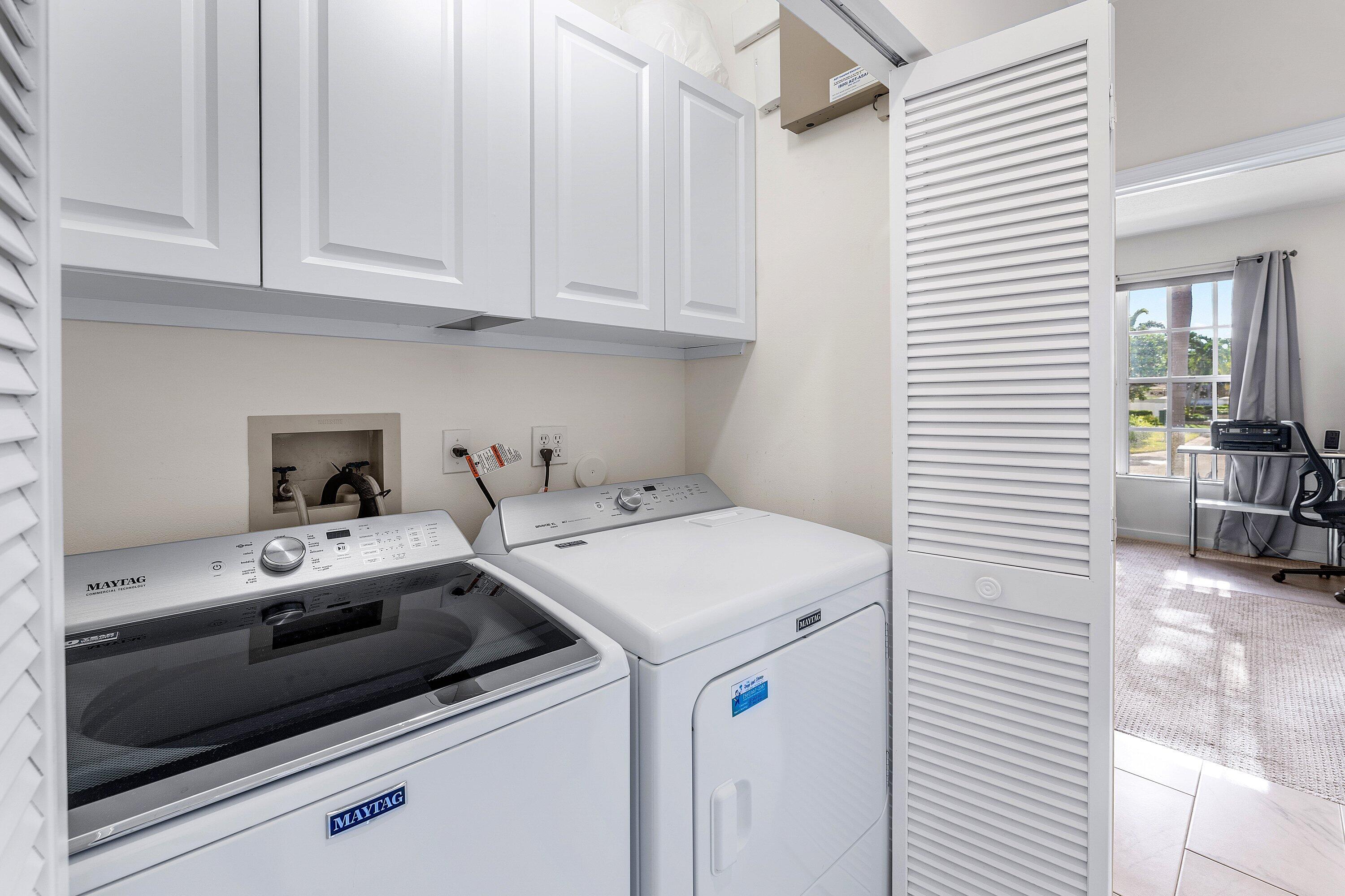 8217 Quail Meadow Way West Palm Beach, FL 33412 - Photo 27 of 38 a utility room with dryer and washer