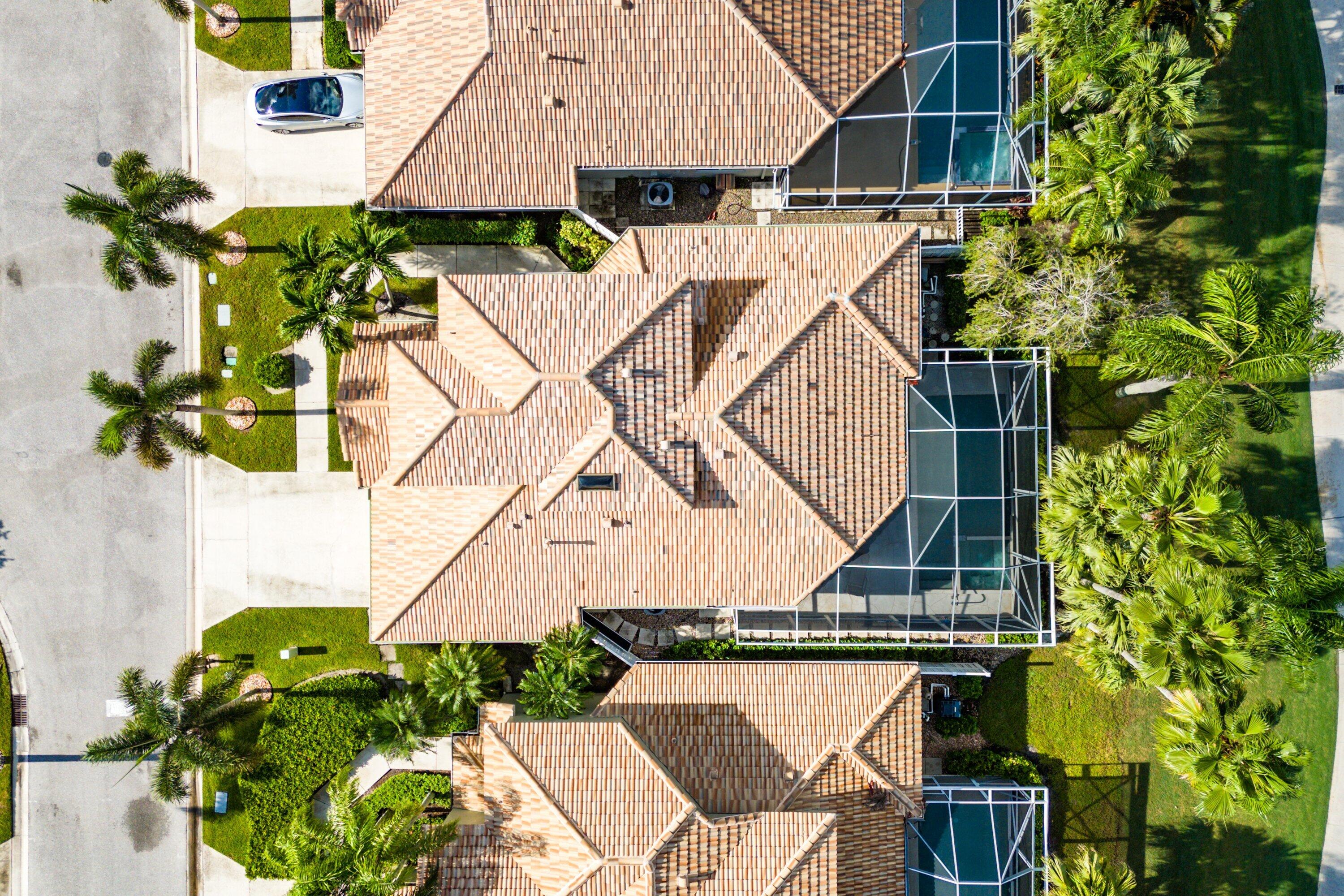 8217 Quail Meadow Way West Palm Beach, FL 33412 - Photo 34 of 38 an aerial view of a house with a yard and sitting area