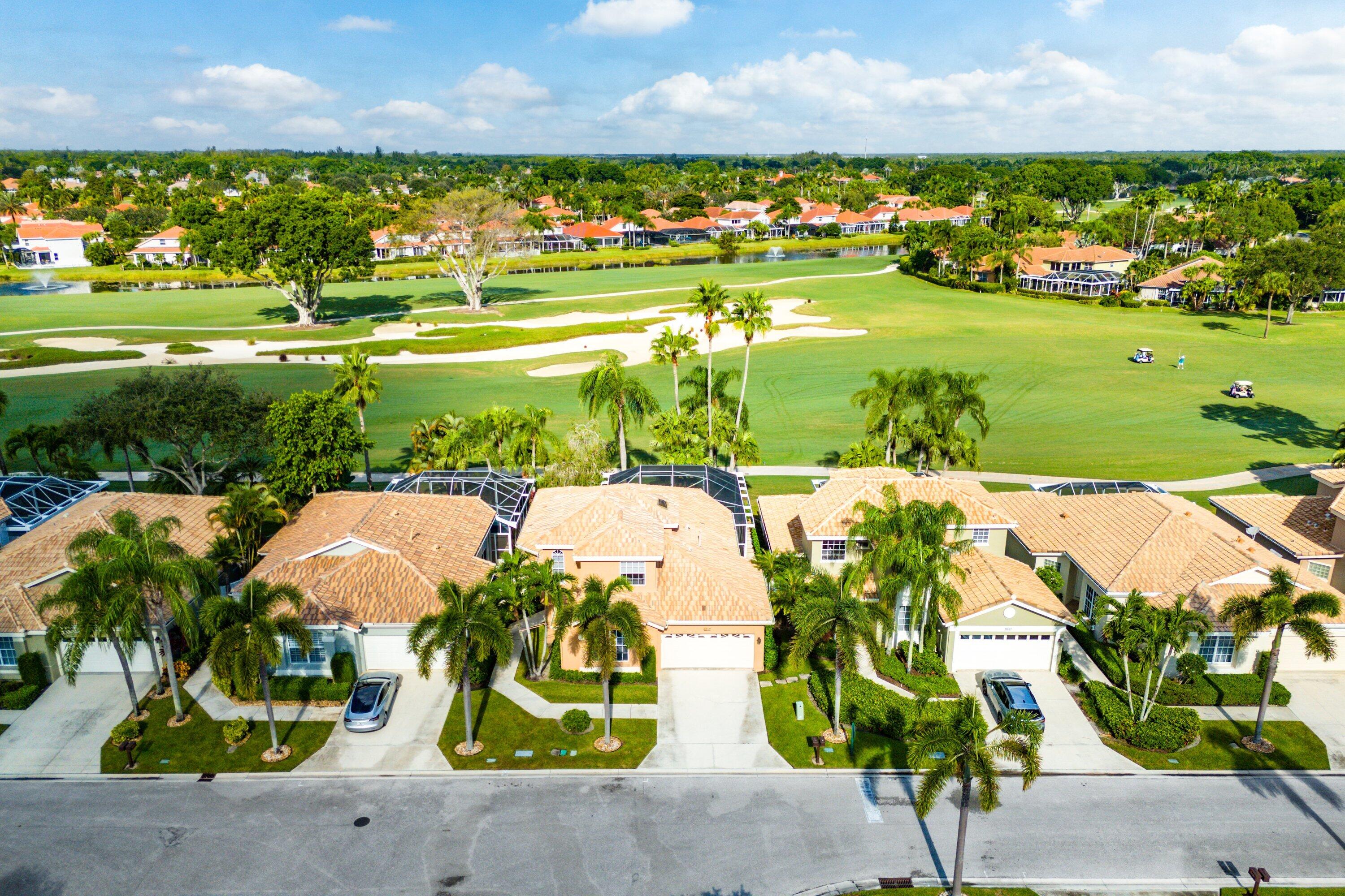 8217 Quail Meadow Way West Palm Beach, FL 33412 - Photo 35 of 38 an aerial view of a houses with outdoor space and street view