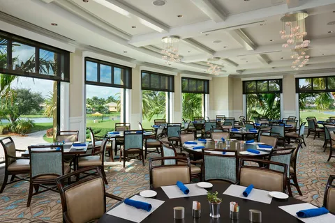 a view of a golf course with a lake