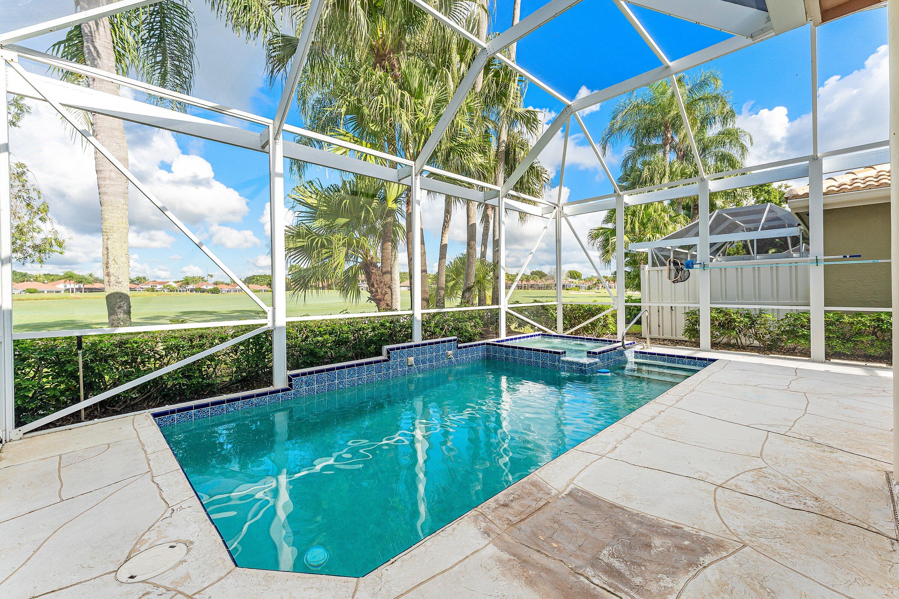 8217 Quail Meadow Way West Palm Beach, FL 33412 - Photo 6 of 38 a view of swimming pool from a balcony