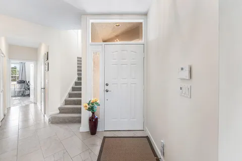 a view of entryway with wooden floor
