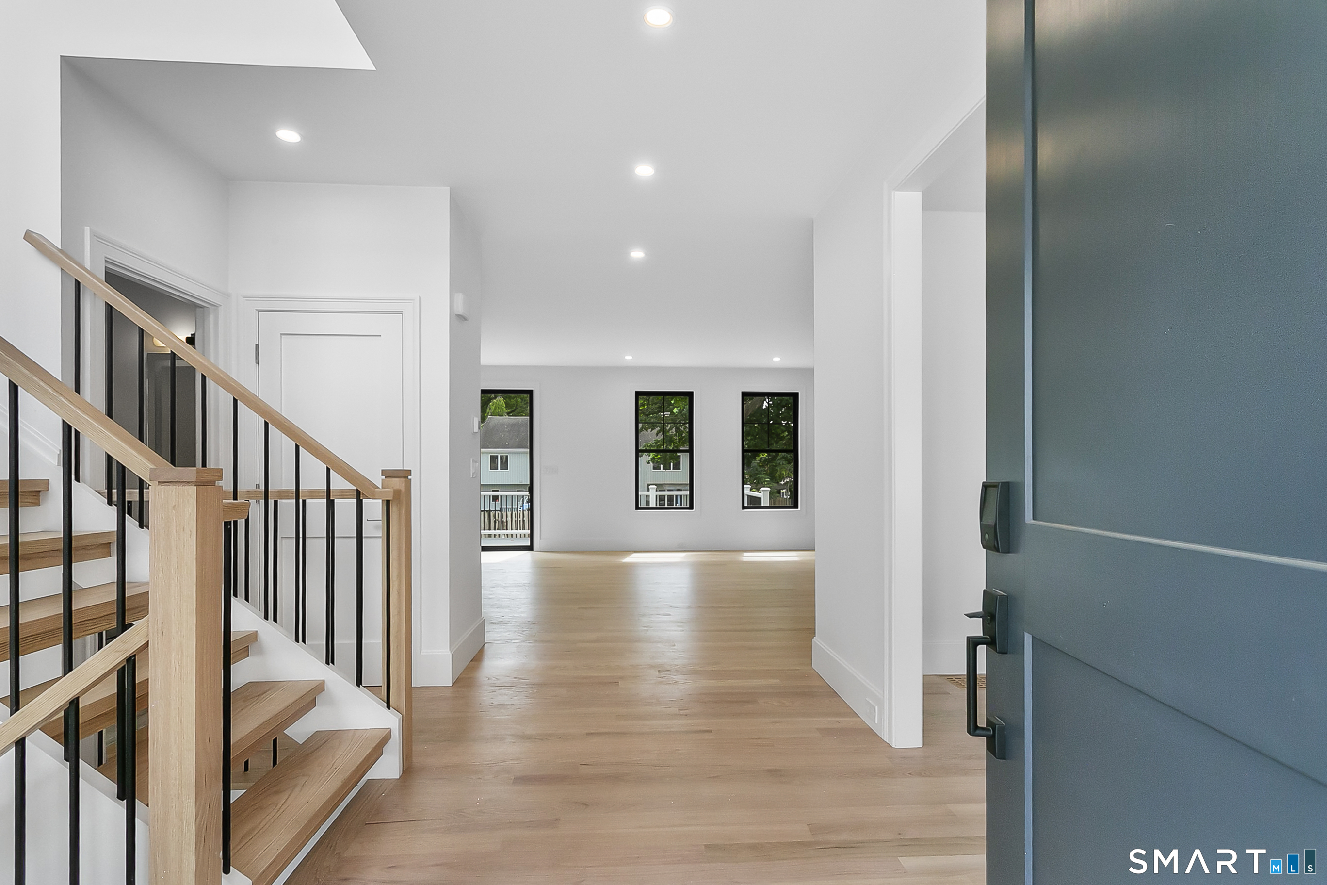 85 Oronoque Hills Road Stratford, CT 06614 - Photo 2 of 37 a view of an entryway with wooden floor