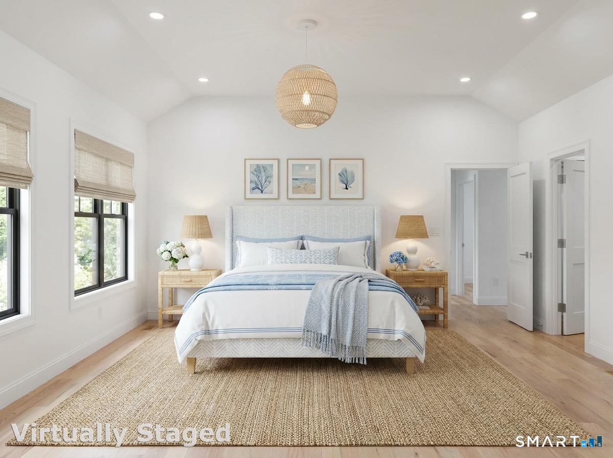 85 Oronoque Hills Road Stratford, CT 06614 - Photo 24 of 37 a spacious bedroom with a bed and window