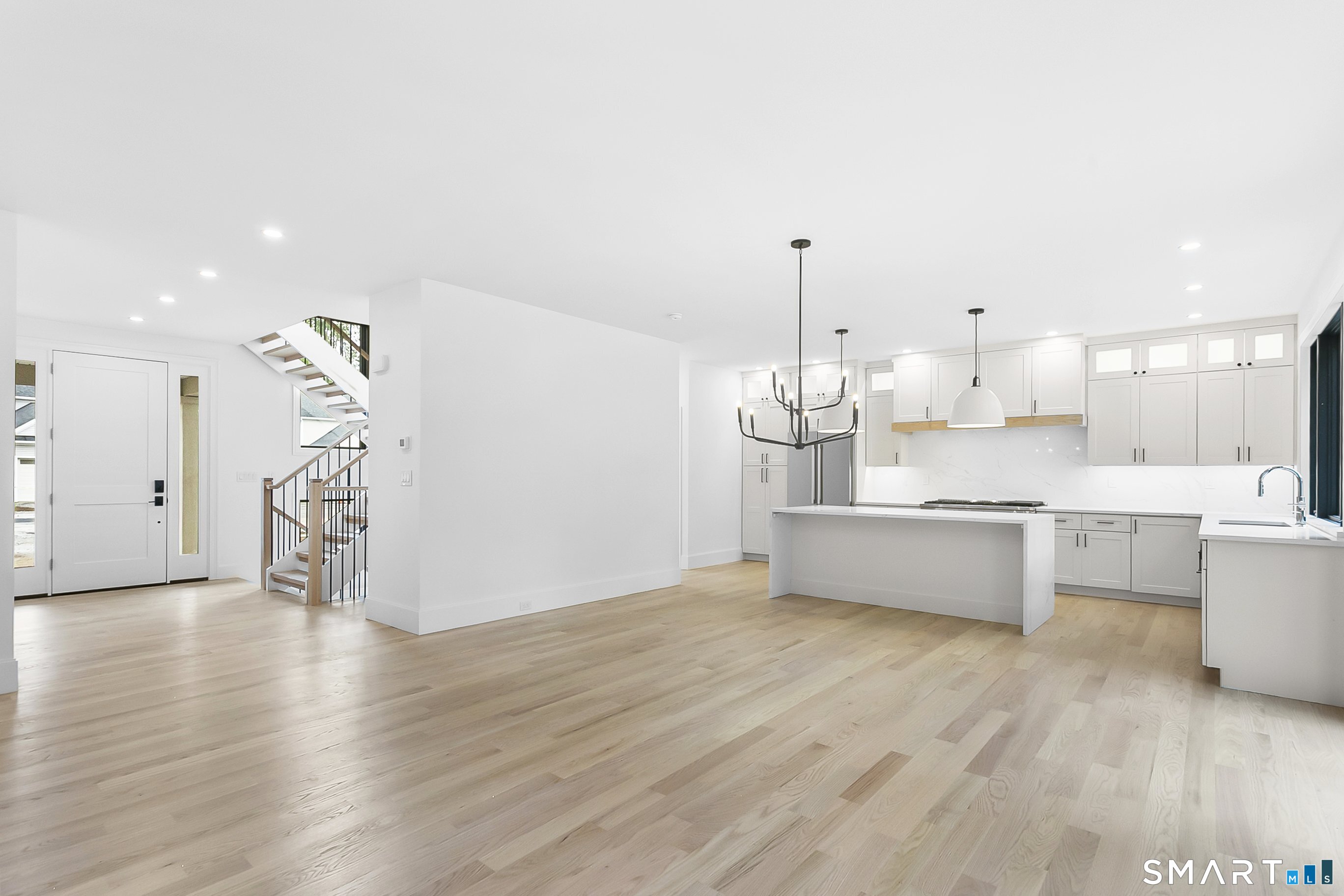 85 Oronoque Hills Road Stratford, CT 06614 - Photo 6 of 37 a large kitchen with a lot of counter space and wooden floor