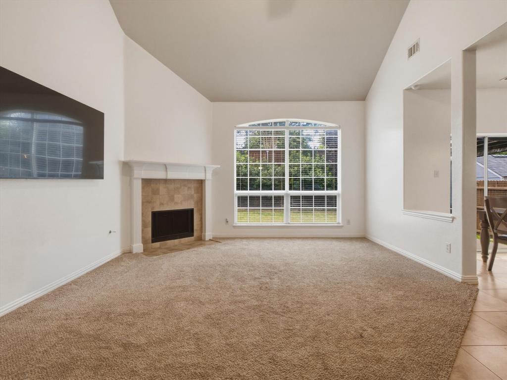 2364 Ranchview Drive Little Elm, TX 75068 - Photo 6 of 33 Living area with exterior views, vaulted ceiling