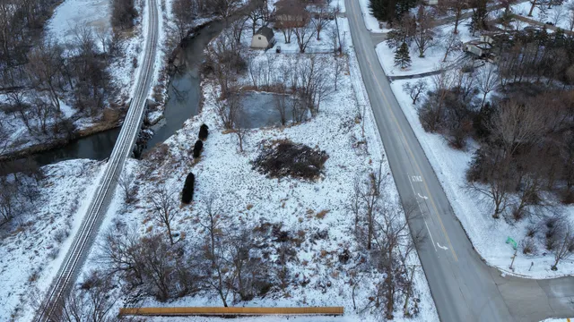 a view of a backyard of the house