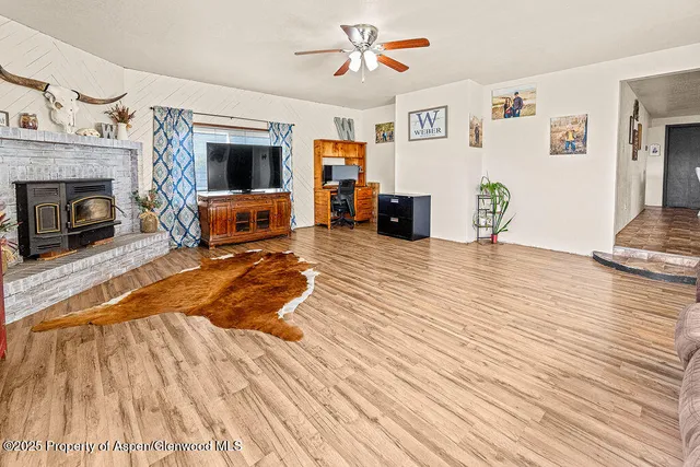a view of a storage room with water heater and racks