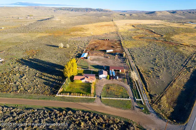 a view of a house with a big yard