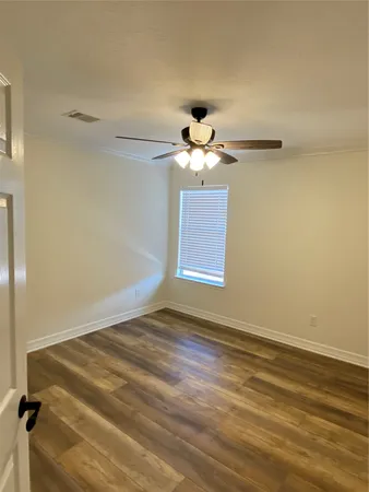 a view of an empty room with window