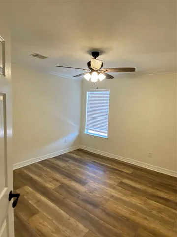 a view of an empty room with window