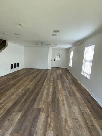 an empty room with windows