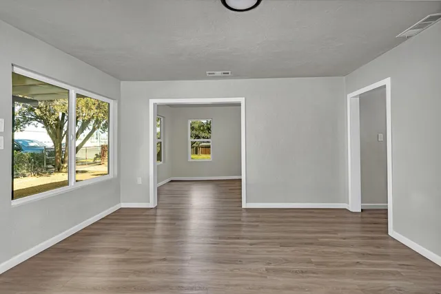 an empty room with windows