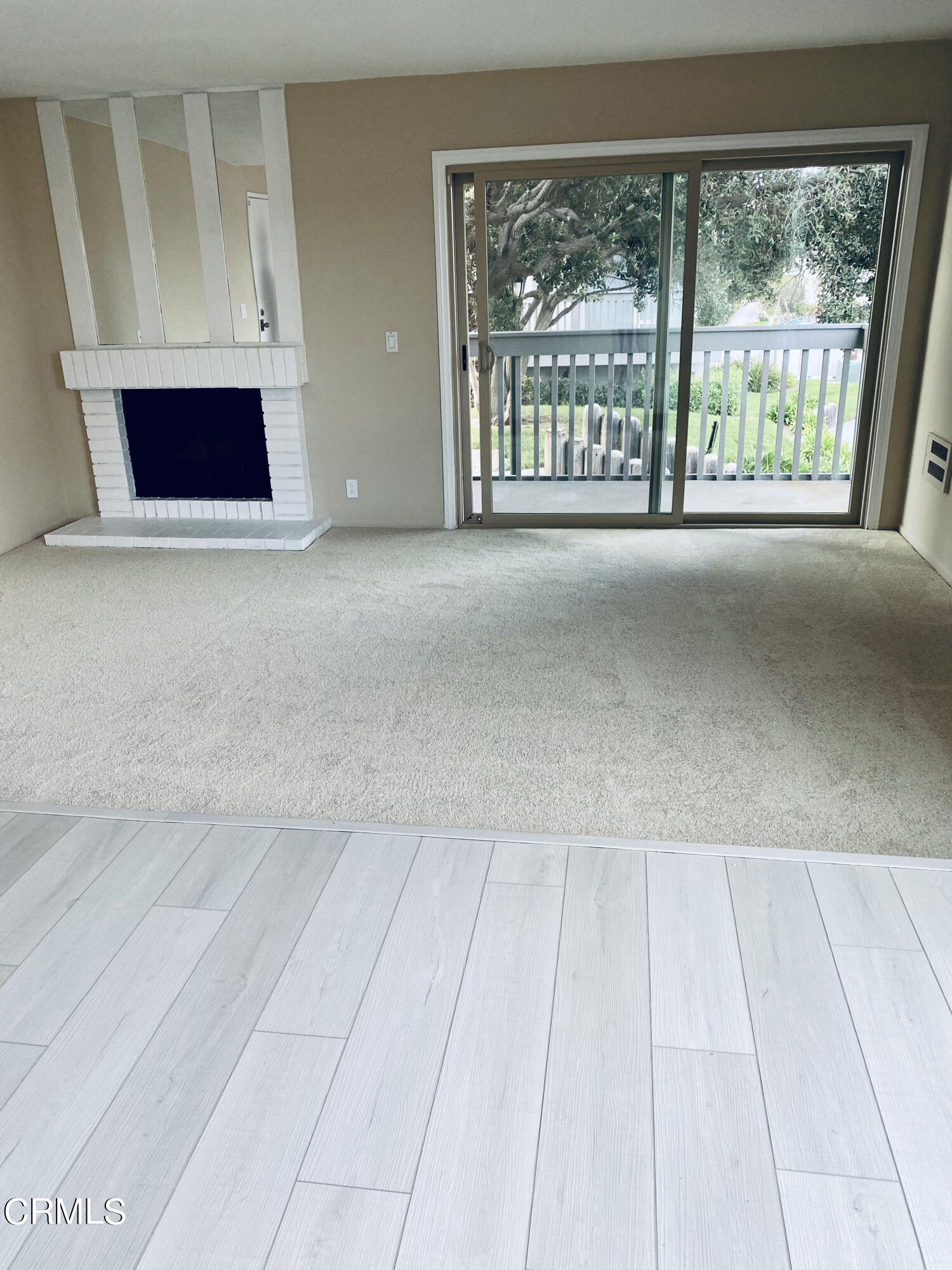 3134 Sunset Lane Oxnard, CA 93035 - Photo 5 of 21 a view of an empty room with a window