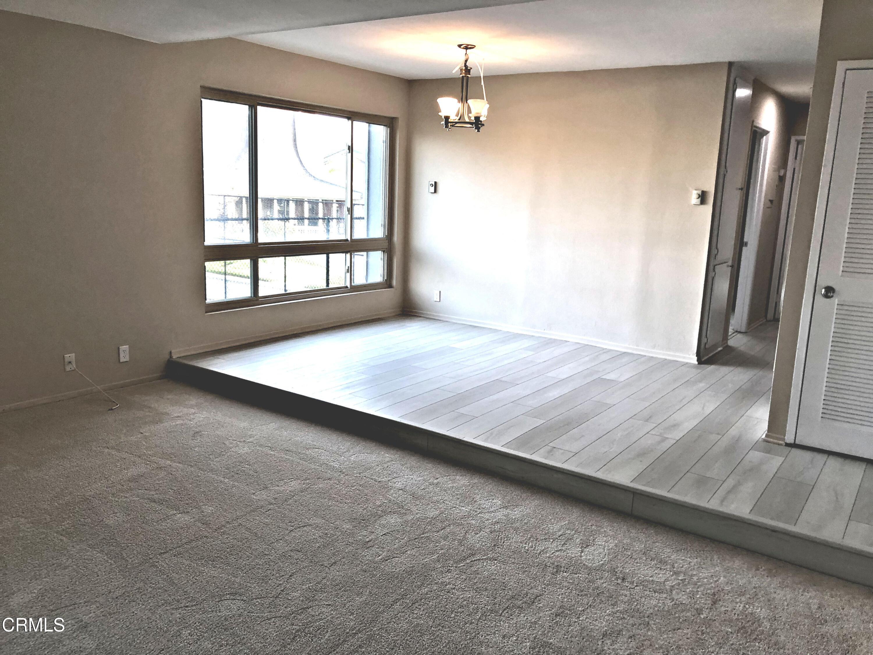 3134 Sunset Lane Oxnard, CA 93035 - Photo 6 of 21 wooden floor in an empty room with a window