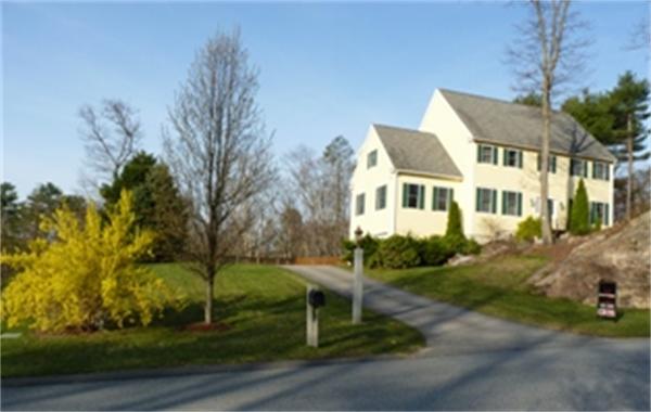 13 Parsons Hill Road Wenham, MA 01984 - Photo 1 of 5 a front view of a house with a yard