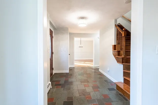 a view of hallway with walk in closet