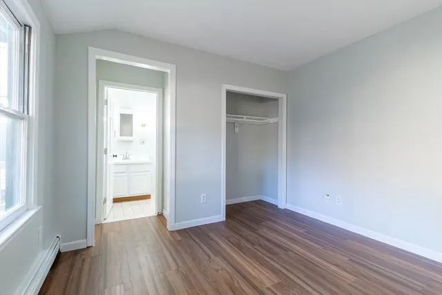 a view of wooden floor in an empty room