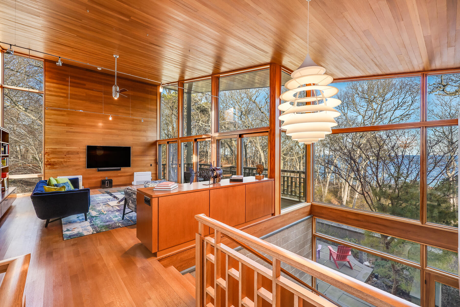 77 Fay Road Falmouth, MA 02543 - Photo 22 of 53 a living room with furniture and a fireplace
