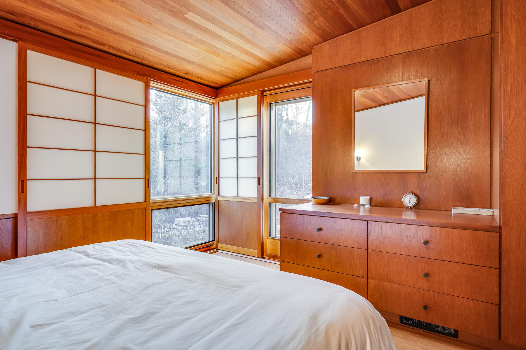 77 Fay Road Falmouth, MA 02543 - Photo 32 of 53 a bedroom with a bed and a dresser next to a window