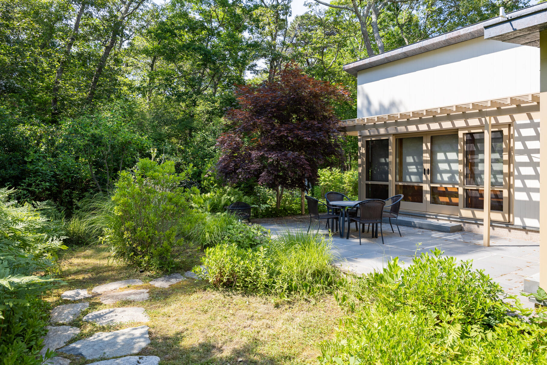77 Fay Road Falmouth, MA 02543 - Photo 45 of 53 a view of a house with backyard and sitting area