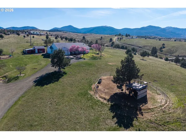 a terrace of a house with outdoor seating