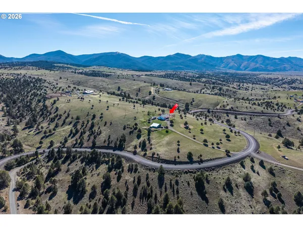 a view of a outdoor space with a mountain