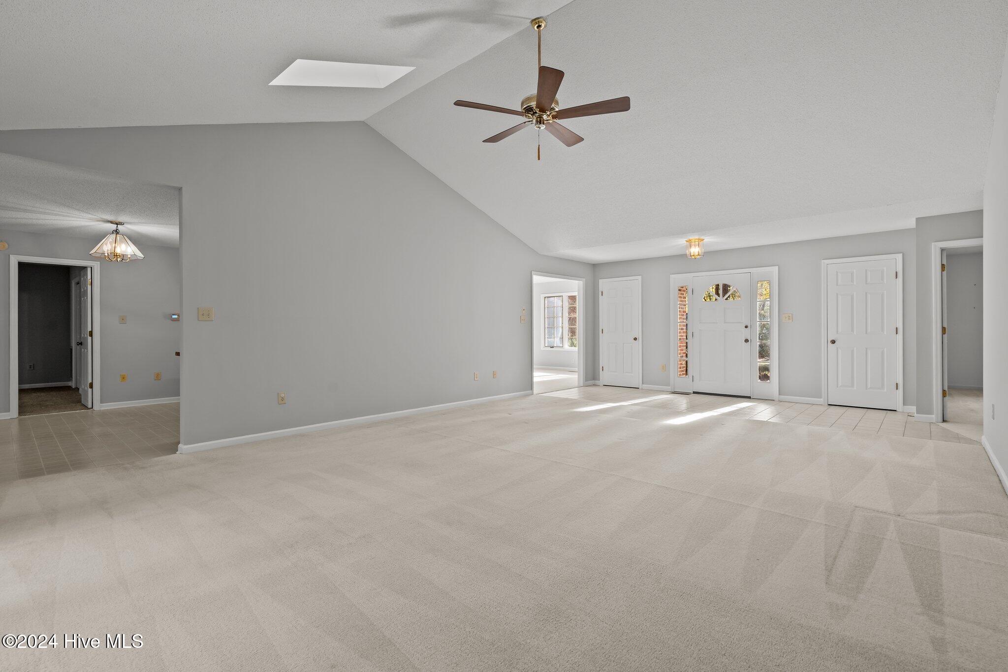 560 South Bethesda Road Southern Pines, NC 28387 - Photo 15 of 53 Living room with view to the kitchen area.