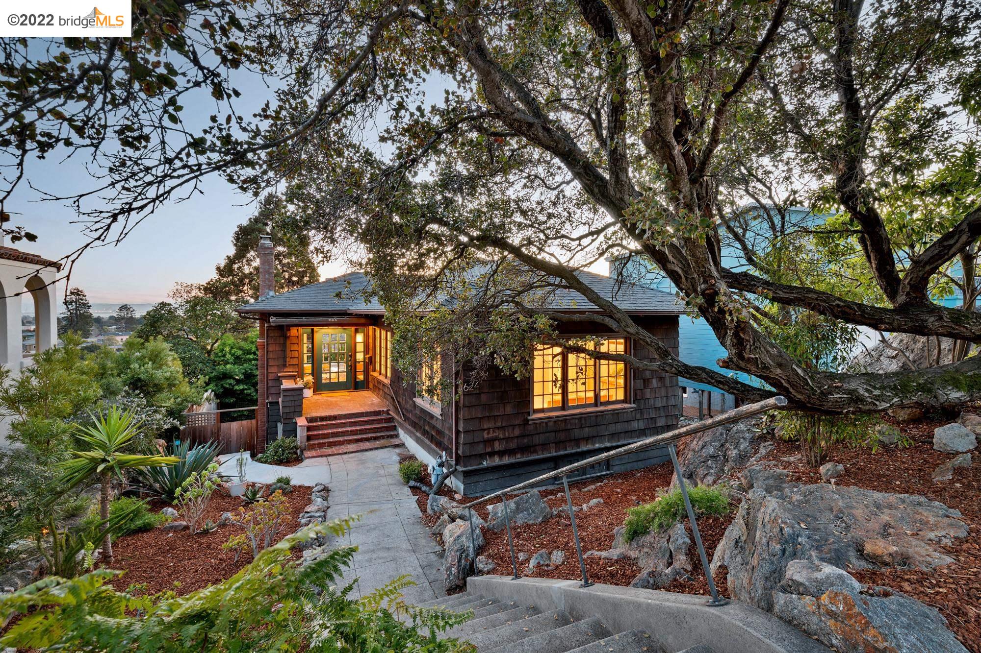624 Vincente Avenue Berkeley, CA 94707 - Photo 1 of 1 a front view of a house with a yard