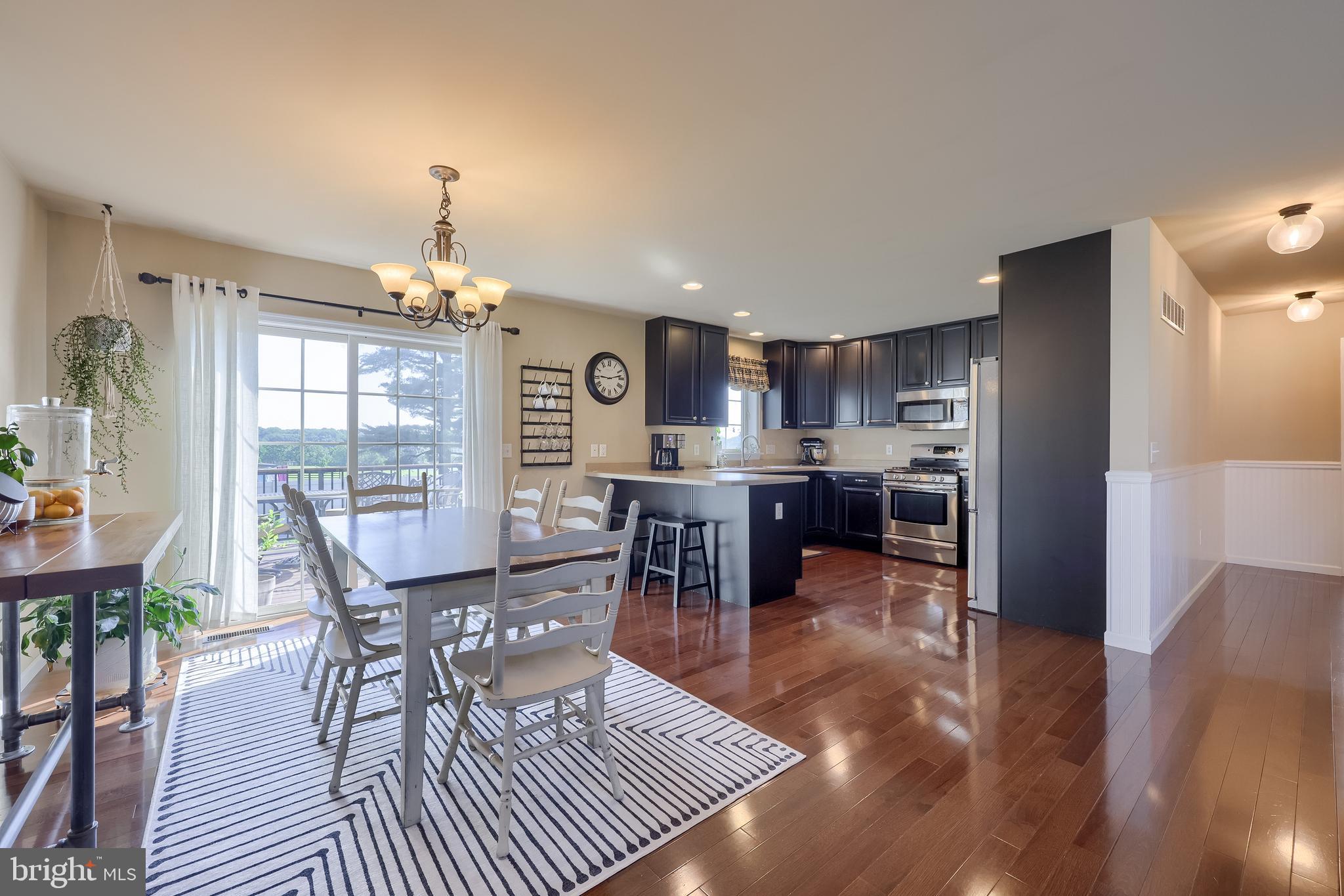 631 Owl Hill Road Lititz, PA 17543 - Photo 11 of 56 a view of a dining room with furniture window and wooden floor