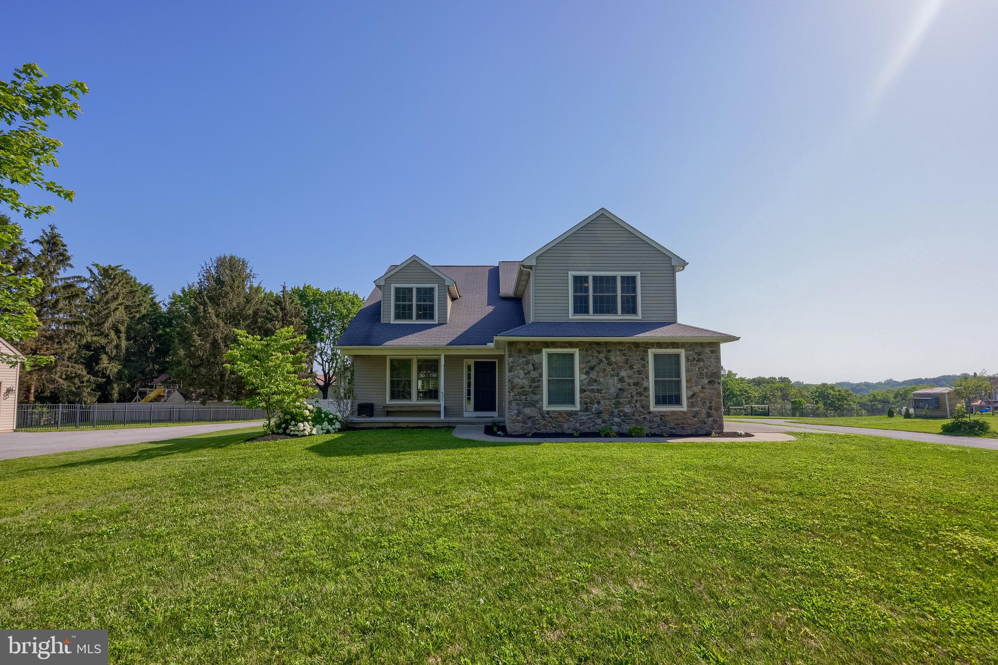 631 Owl Hill Road Lititz, PA 17543 - Photo 2 of 56 a front view of a house with garden