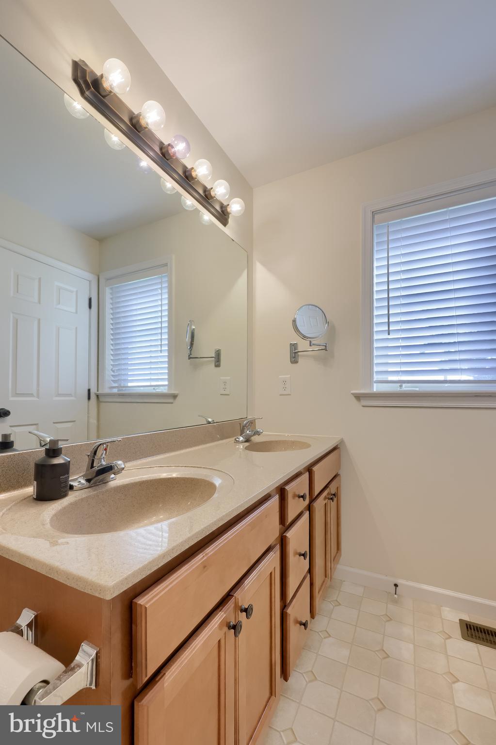 631 Owl Hill Road Lititz, PA 17543 - Photo 23 of 56 a bathroom with a sink and a mirror