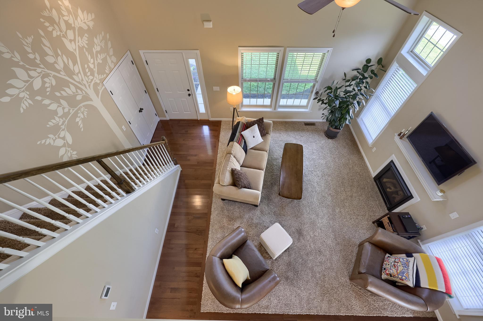 631 Owl Hill Road Lititz, PA 17543 - Photo 29 of 56 a living room with furniture and a flat screen tv