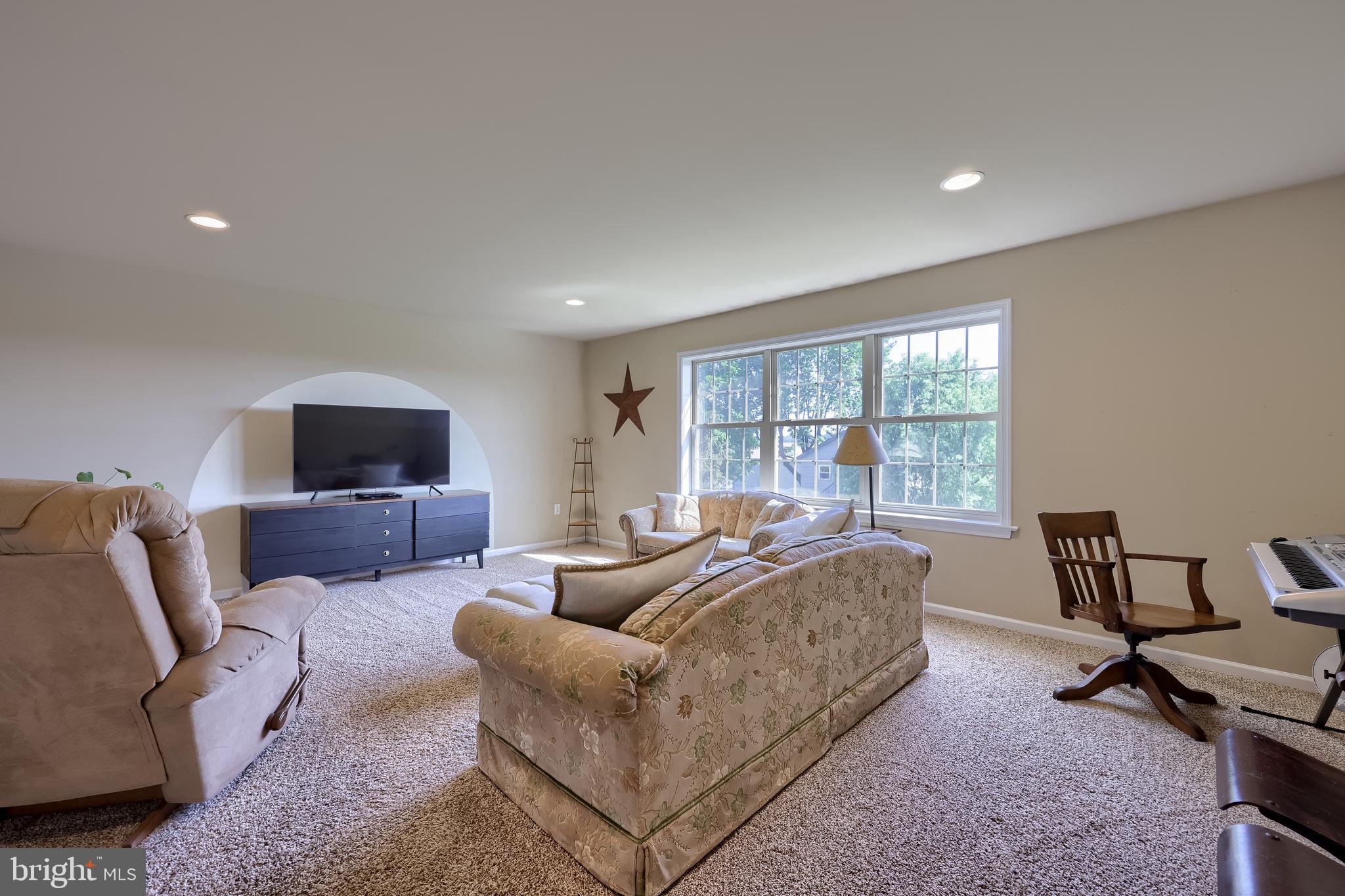 631 Owl Hill Road Lititz, PA 17543 - Photo 31 of 56 a living room with furniture and a window