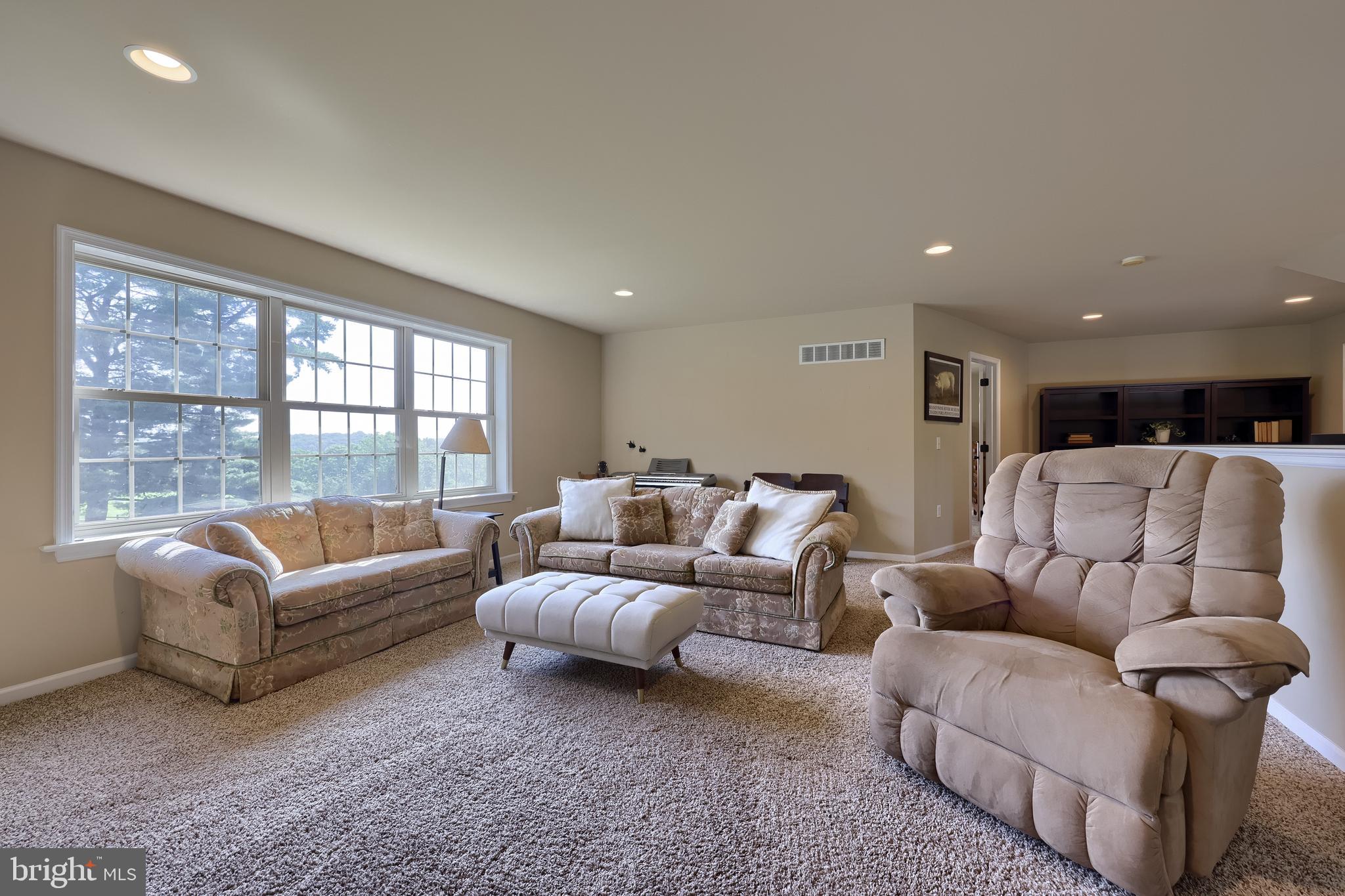 631 Owl Hill Road Lititz, PA 17543 - Photo 33 of 56 a living room with furniture and a large window