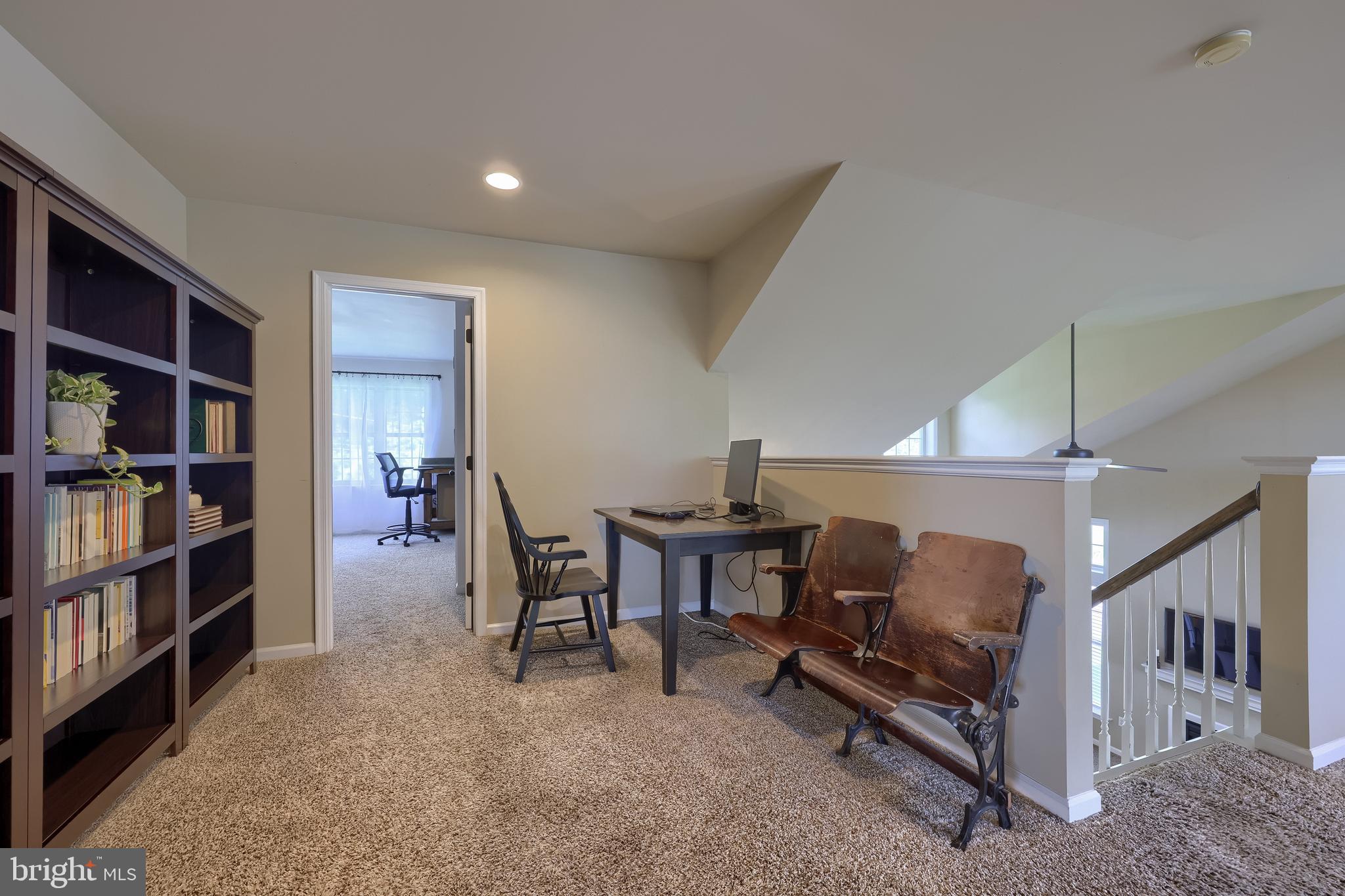 631 Owl Hill Road Lititz, PA 17543 - Photo 36 of 56 a workspace with furniture bookshelf and a window