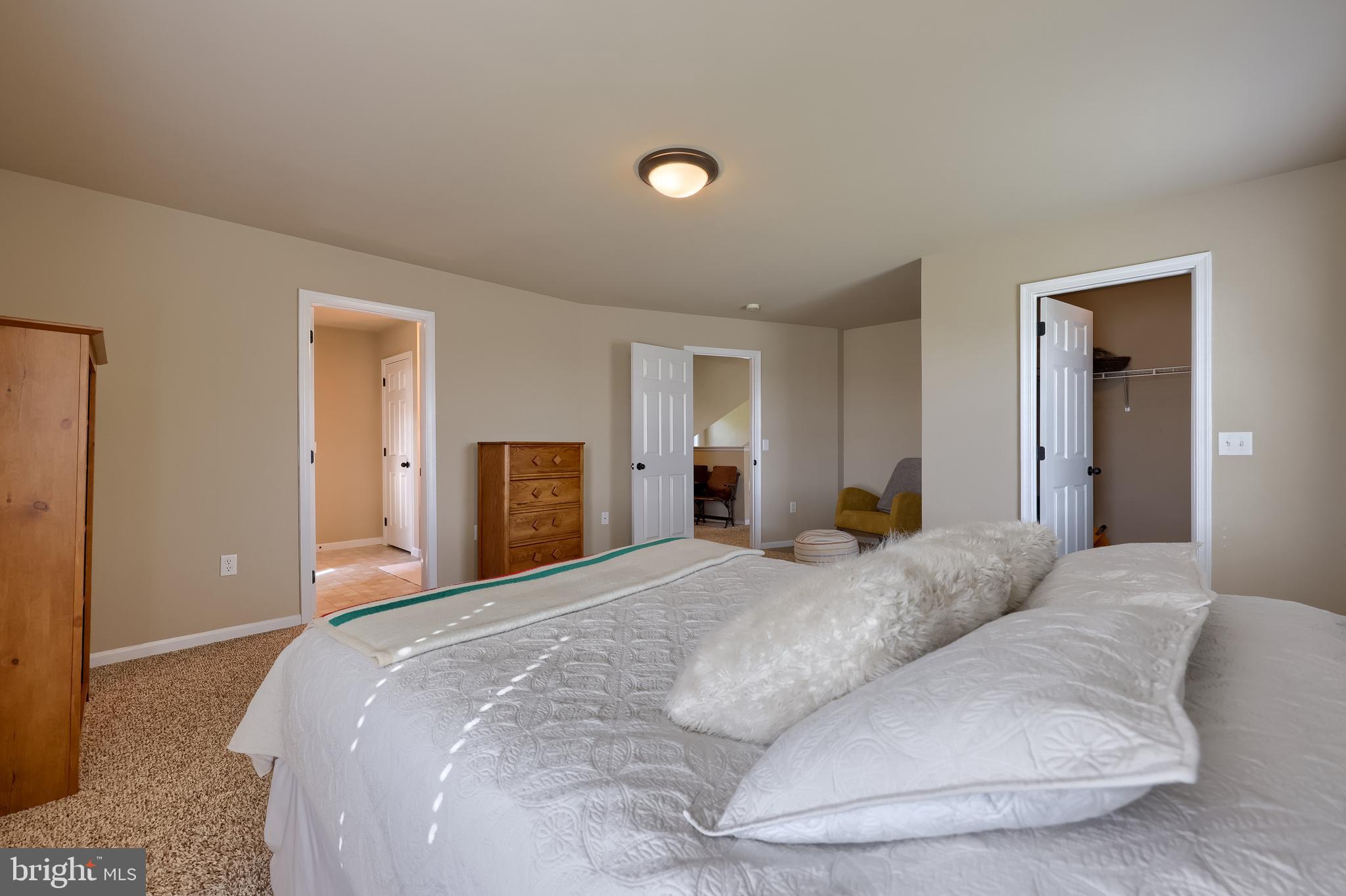 631 Owl Hill Road Lititz, PA 17543 - Photo 39 of 56 a bedroom with a bed and a couch