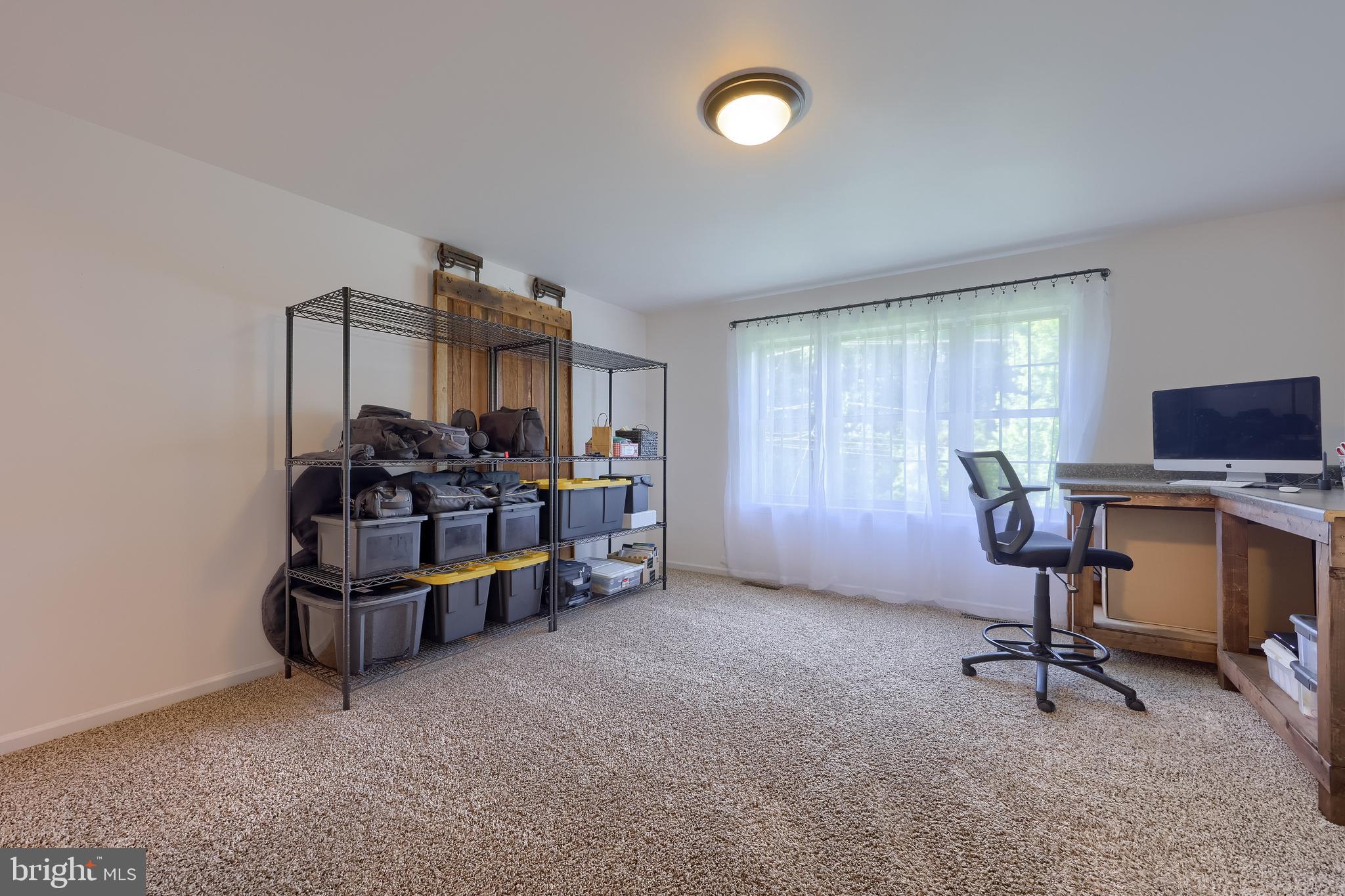631 Owl Hill Road Lititz, PA 17543 - Photo 43 of 56 a view of a workspace with furniture and a window