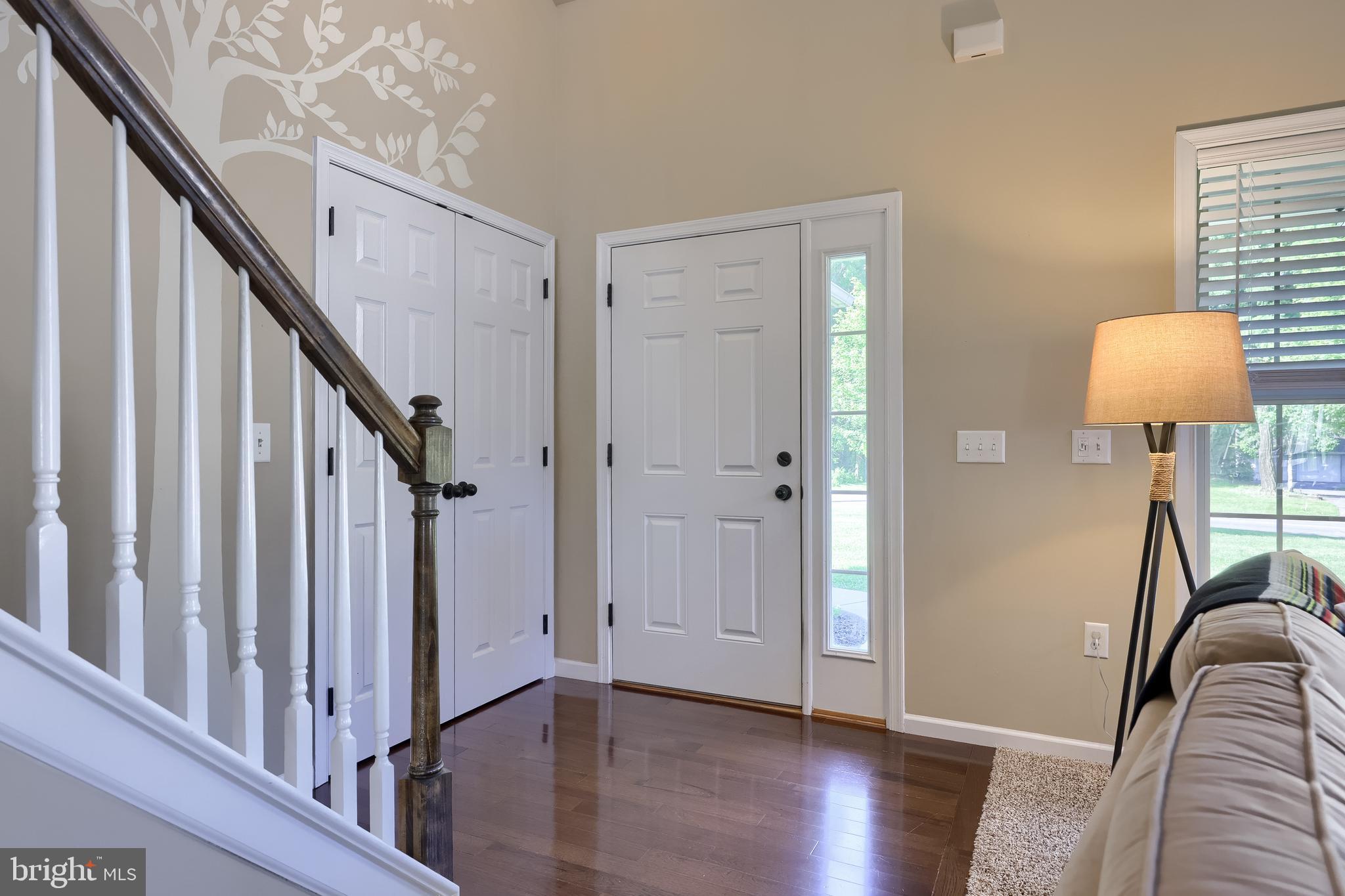 631 Owl Hill Road Lititz, PA 17543 - Photo 5 of 56 a view of a hallway with wooden floor and staircase